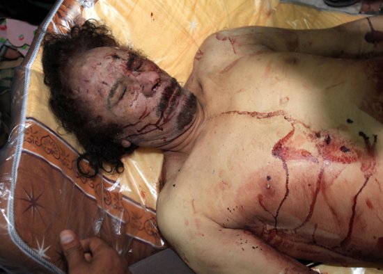 【组图】卡扎菲藏身下水道被击毙的惨状948 / 作者:灭绝师太 / 帖子ID:1998